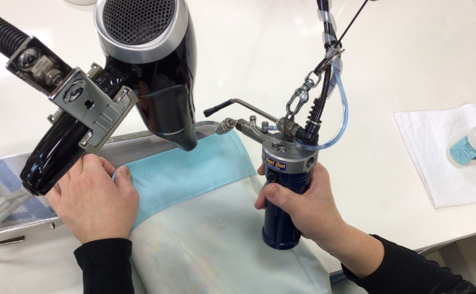 機械によるシミ抜き